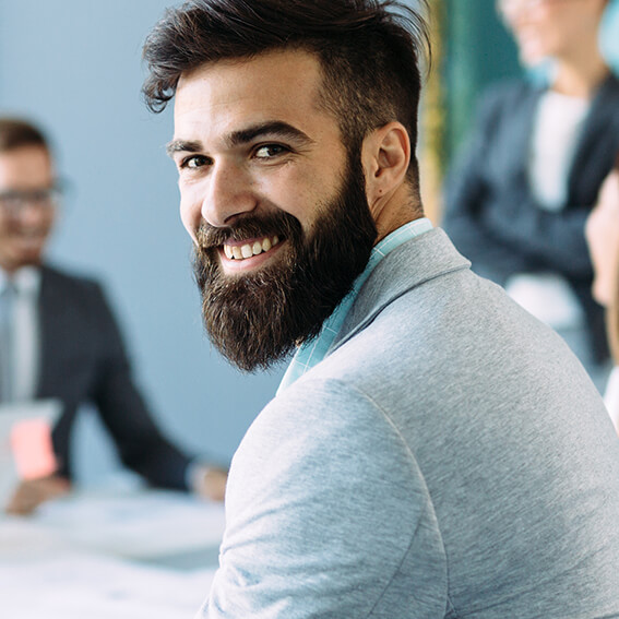portrait-of-young-male-architect-on-meeting-PAHNTXG1.jpg
